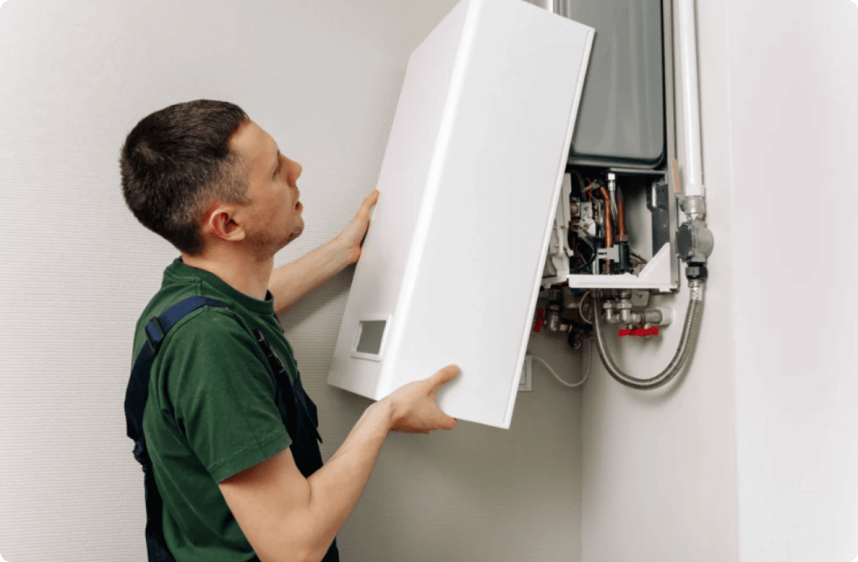 Man fixing a boiler