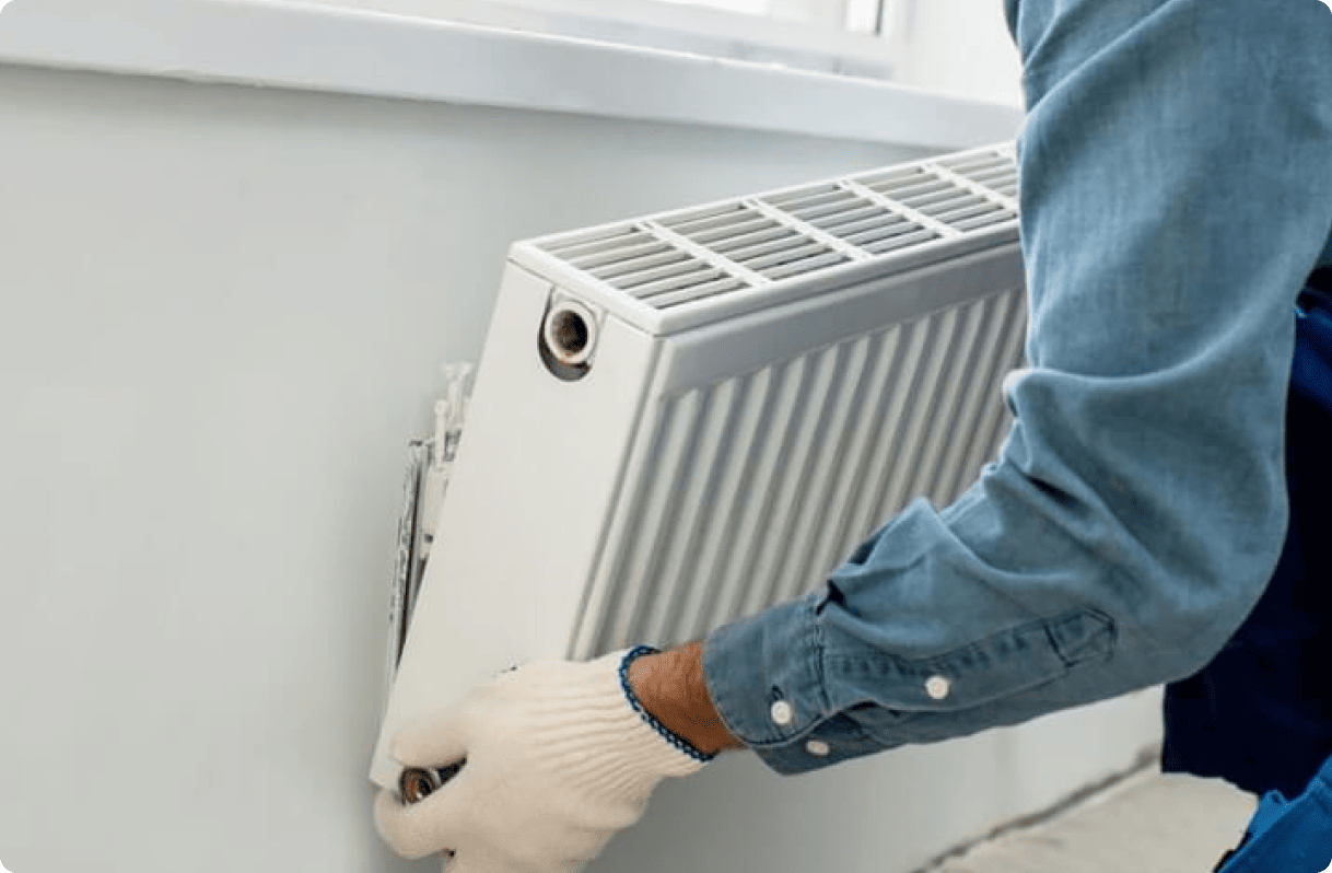 Man mounting a heater